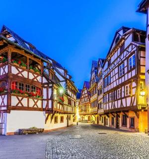 a street in an old town at night