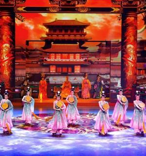 a group of people on the stage in a performance