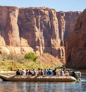 a group of people on a raft in the water