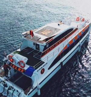 a boat in the water with people on it