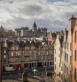 a view of a city with buildings and a castle
