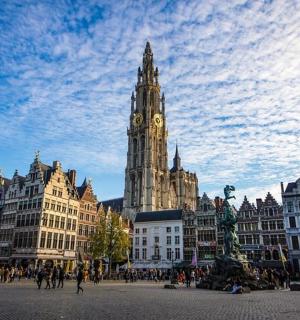 a building with a clock tower in a city