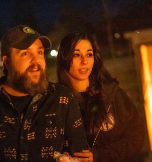 a man and a woman standing next to each other