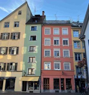 a group of buildings on a city street