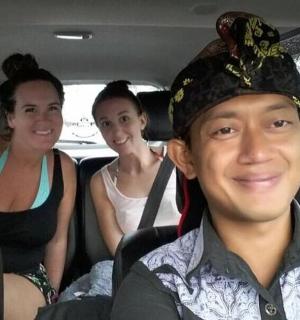 a group of people sitting in a car