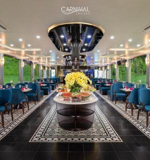 a dining room with tables and blue chairs