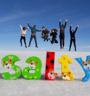 a group of people jumping in the snow with the word speed