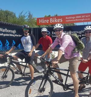 a group of people on bikes posing for a picture