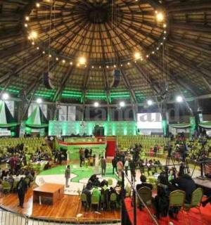 a large room with a large crowd of people in it