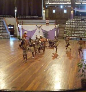 a group of people dancing on a dance floor