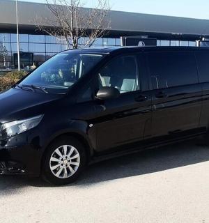 a black van parked in a parking lot