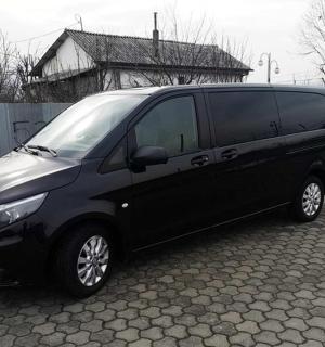 a black van is parked on a street