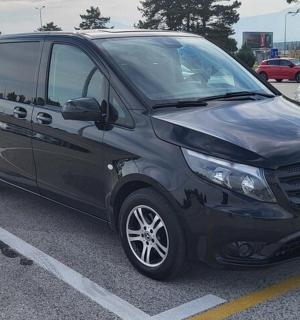 a black van parked in a parking lot