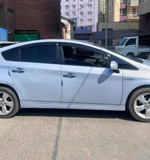 a white car parked in a parking lot