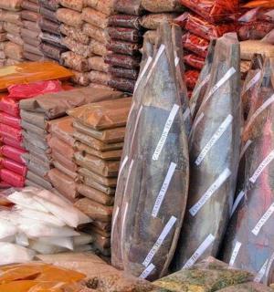 a display of different types of breads and other baked goods