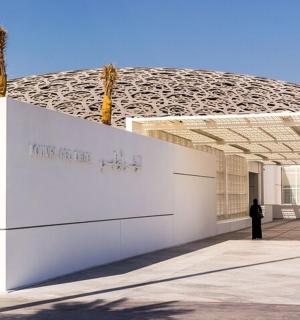 a person standing in front of a building