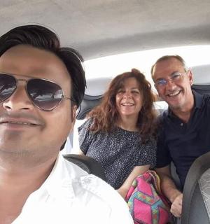 a group of people sitting in a car