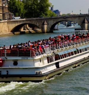 a group of people on a boat in the water