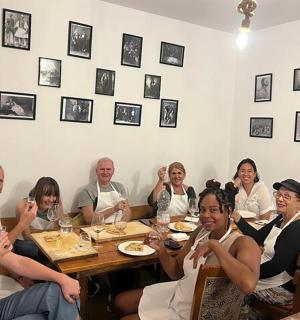 a group of people sitting around a table
