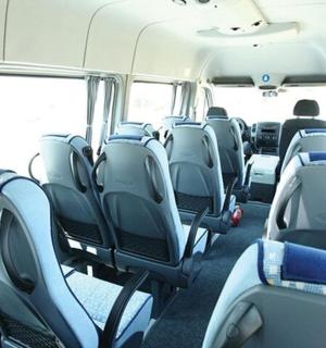 a bus with empty seats on a bus