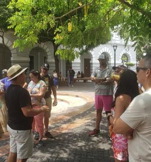 a group of people standing outside of a building