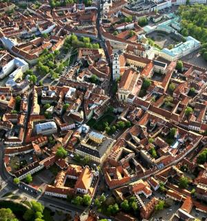 an overhead view of a city with many buildings