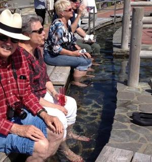a group of people sitting on a bench