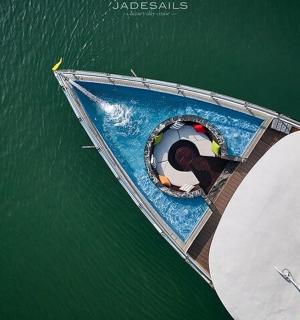 a boat in the water with a person in it