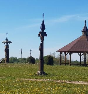 a gazebo and a pavilion in a field