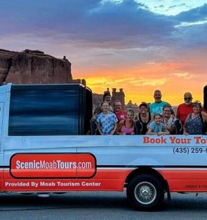 a group of people in the back of a truck