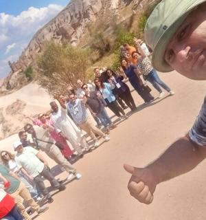 a man standing in front of a group of people