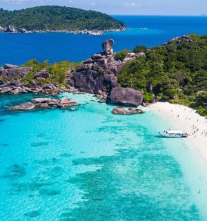 an aerial view of a beach with people on it