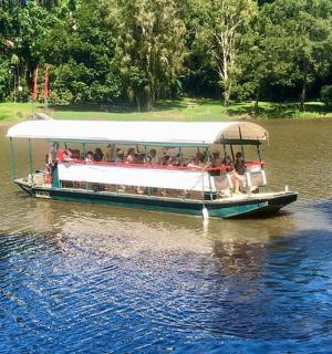 a group of people riding a boat on the water