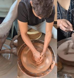 一名妇女在陶轮上制作陶罐