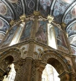 a church with a painting on the ceiling