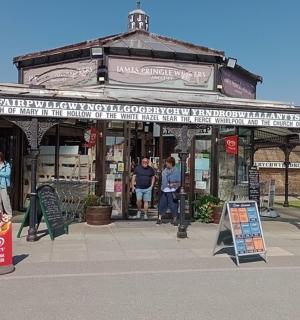 a building with people standing outside of it