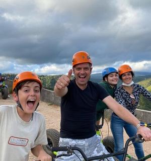 a group of people wearing helmets on their bikes