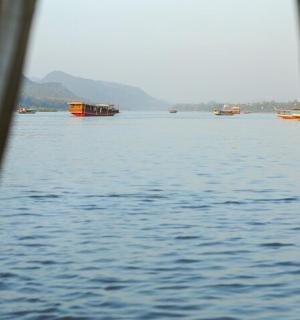 a view of a large body of water with boats