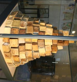 a display case filled with lots of wine bottles