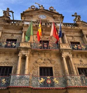 a building with flags on top of it