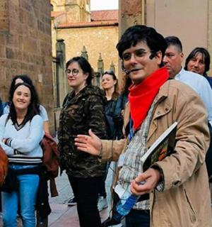 a man standing in front of a group of people