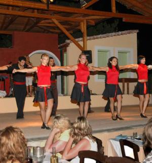 a group of people dancing on a stage