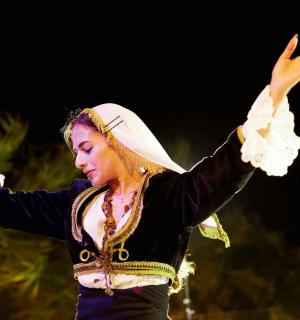 a woman performing a dance in a performance