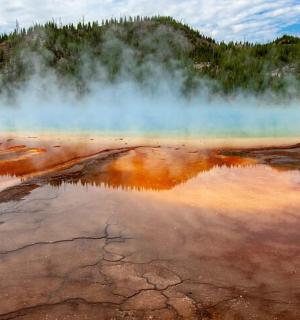 a body of water with a bunch of steam