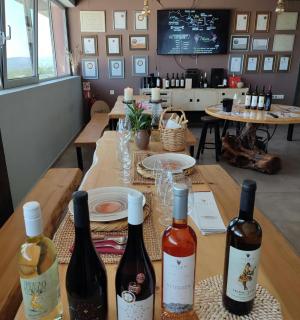 a group of bottles of wine sitting on a table