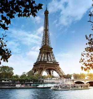 a view of the eiffel tower from the river