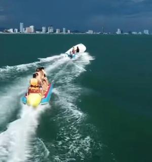 a group of people on a boat in the water