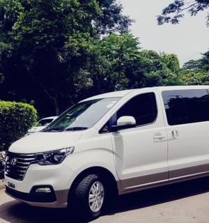 a white van parked in a parking lot