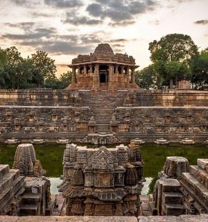 a large building with a fountain in the middle