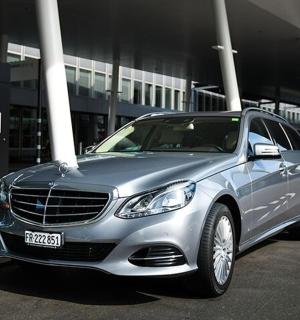 a silver car parked in a parking lot